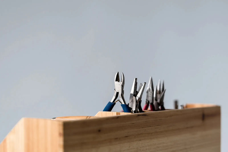 Hand tools in a wooden holder
